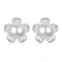 Silver Flower Pearl Studs Earrings, delicate floral design with pearls.