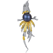 Dancing Dove Brooch with a luminous pearl accent, blending creativity and grace in one elegant design.