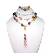 Multi-color Edison pearl set showcasing varied shapes and hues of lustrous pearls.