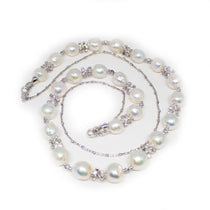 Multi-Way Baroque Opera Pearl Necklace – Versatile baroque pearl necklace styled for choker or long-layered elegance.
